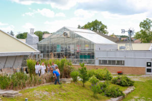 Outside the CAWT Centre for Advancement of Water and Wastewater Technologies at Fleming College Forst Campus in Lindsay Ontario Research Scientists and Students looking at the wetland